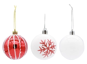 Detailed view of three painted Christmas balls with red stripes and snowflake patterns