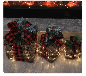 Three-piece Christmas rattan gift boxes with warm LED lights and buffalo plaid bows