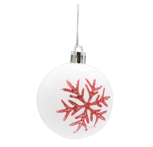 Detail of white Christmas ball ornament with red glitter snowflake and silver hanging string