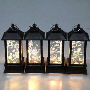Lot de quatre lanternes d'Halloween avec motifs citrouille et crâne, lumières LED chaudes