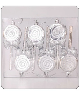 Close-up of six glittery silver lollipop Christmas ornaments in a transparent box