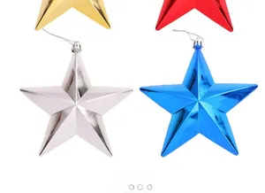 Close-up of four-color electroplated 15cm Christmas star ornaments with hanging ropes