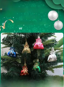 Macro detail of colorful metallic Christmas money bag ornaments with snowflake patterns
