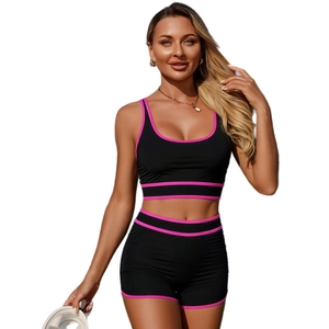 Set bikini sportivo a due pezzi in nero con bordo rosa vivace per il nuoto attivo