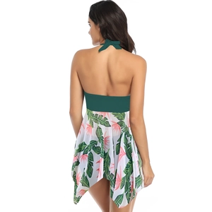 Back view detail of plus size halter neck swimsuit with green tropical botanical print