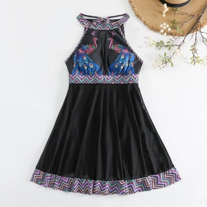 Flat lay of ethnic-style halter one-piece swimsuit with mesh skirt and peacock patterns