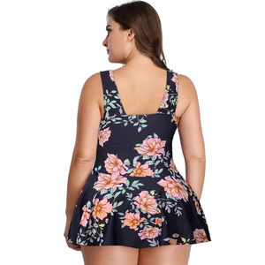 Rear view of plus size floral print swim dress with U-back design and pleated skirt