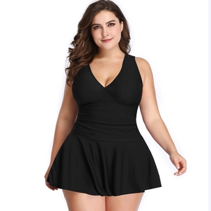 Plus size black V-neck slimming swimdress with pleated skirt and tummy control