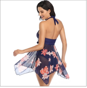 Detail of cross tie back and floral chiffon skirt on deep blue bikini swimwear