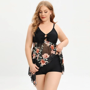 Detail of plus size floral mesh skirt with orange flowers and high waisted swim shorts