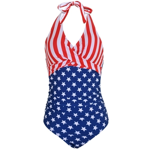 Detail of cross halter neck and ruched belly on American flag print one-piece swimsuit
