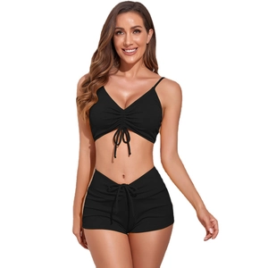 Black ribbed bikini set with drawstring details and high-waisted shorts for fitness