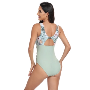 Maillot de bain une pièce avec imprimé tropical, dos nu et fermoir en métal doré