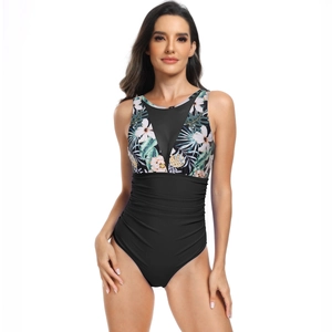Détail de l'imprimé floral tropical sur le maillot de bain une pièce avec col en V en mesh