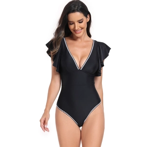 Detail shot of black one-piece swimsuit with ruffle sleeves and white wavy edge trim