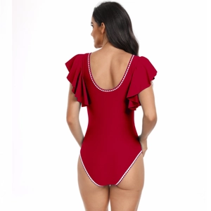 Back view of a red one-piece swimsuit with ruffle sleeves and white wavy scallop trim