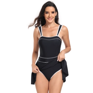 Women's black and white one-piece swimsuit dress with sporty contrast trim and wide straps