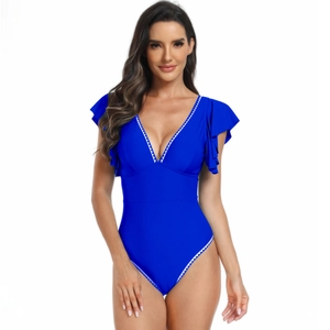 Detail of royal blue one-piece swimsuit featuring ruffled sleeves and white wavy edge trim
