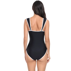 Women's black one-piece swimsuit with white contrast piping and open U-back design