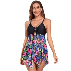 Black tankini swimsuit with floral print skirt and cutout lace-up chest detail