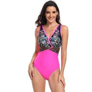 Maillot une pièce à fleurs avec décolleté en V et bas rose fuchsia en tissu extensible