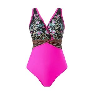 Détail d'un maillot de bain une pièce col en V avec imprimé floral et bas rose fuchsia