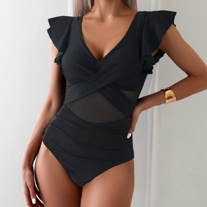 Detail view of black one-piece swimsuit featuring mesh panels and ruffled shoulder straps
