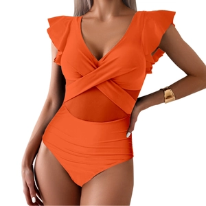 Detail of orange one-piece swimsuit with ruffled shoulders and mesh waist cutouts