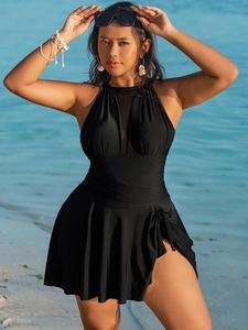 Detail of plus size black halter swimdress with mesh neckline and side drawstring ruching