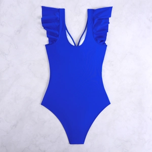 Detailed flat lay of royal blue one-piece swimsuit with ruffled straps and U-neckline