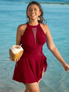 Detail of burgundy plus size halter swimwear with mesh panel and waist ruching