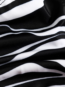 Macro view of zebra print knit fabric texture for high-quality elastic swimwear