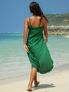 Back view of emerald green waffle knit beach cover-up dress with adjustable straps