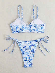 Detail of blue Toile de Jouy floral print bikini set with side tie-side bottoms