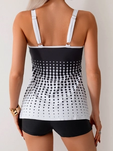 Back view of a two-piece tankini set featuring gradient dot patterns and adjustable straps