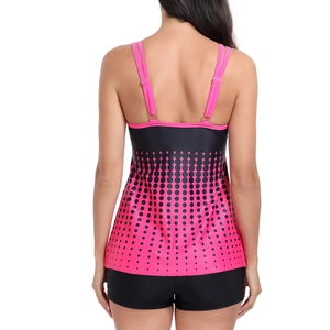 Detail view of pink and black tankini top with polka dot pattern and boyleg swim shorts