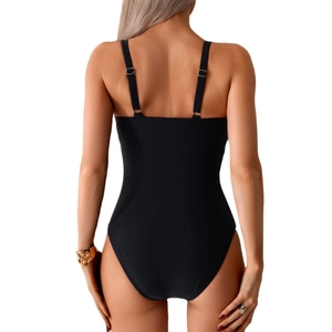Classic black one-piece swimsuit for women with adjustable thin straps and high-cut leg style