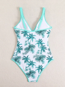 Detail of tropical palm print one-piece swimsuit with V-neck and adjustable mint straps