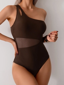 Detail of dark brown one-piece swimsuit with asymmetric shoulder and mesh waist panels