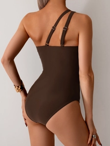 Back view of a coffee brown one-piece swimsuit featuring asymmetric dual shoulder straps
