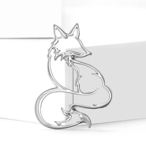 Elegant hollow silver fox brooch pin for women suit and shawl accessory on white decor