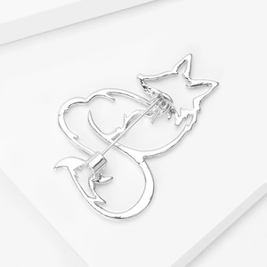 Detailed view of silver hollow fox brooch back with secure pin and clasp fastener