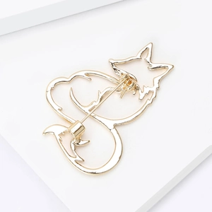 Detailed back view of the hollow fox brooch showing the sturdy metal pin clasp and welding