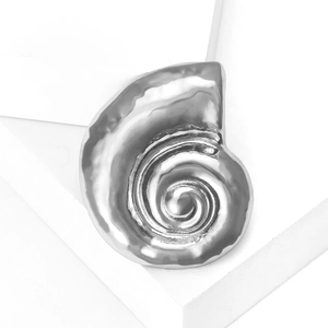 Minimalist silver matte snail shell brooch with a polished spiral nautilus design