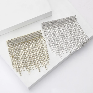 Luxury rhinestone tassel earrings in gold and silver finish with cascading crystal fringe