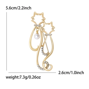 Broche chat minimaliste avec strass et pendentif perle, incluant les dimensions