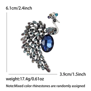 Élégante broche paon avec pierre bleue et strass multicolores de 6,1 cm x 3,9 cm