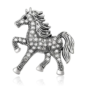 Elegant vintage horse brooch in silver alloy with micro-set rhinestones on white background