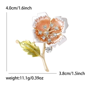 Pink enamel flower brooch with rhinestones and size dimensions on white background