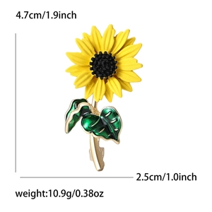 Broche tournesol en émail avec pétales jaunes et feuilles vertes pour costume